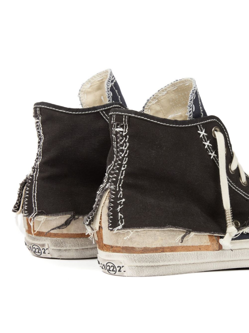 distressed high-top sneakers