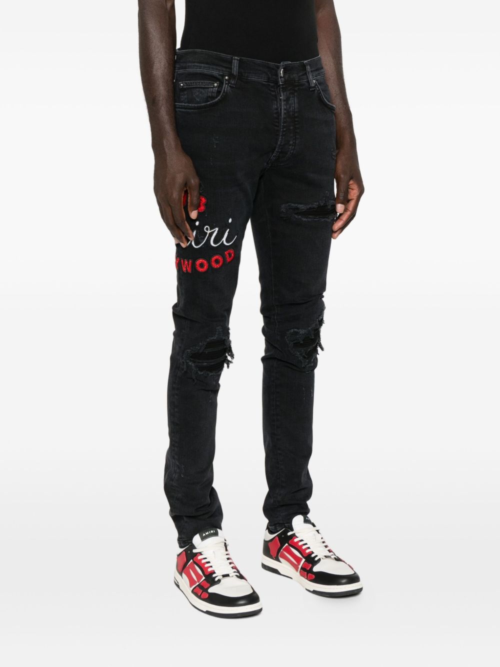 embroidered distressed jeans