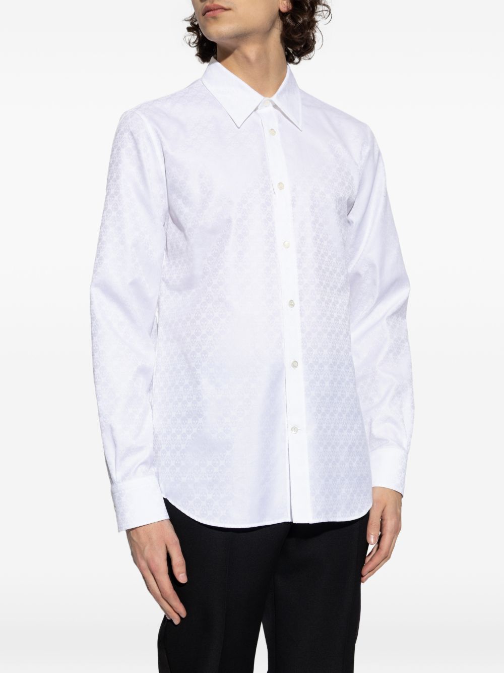 skull-print shirt