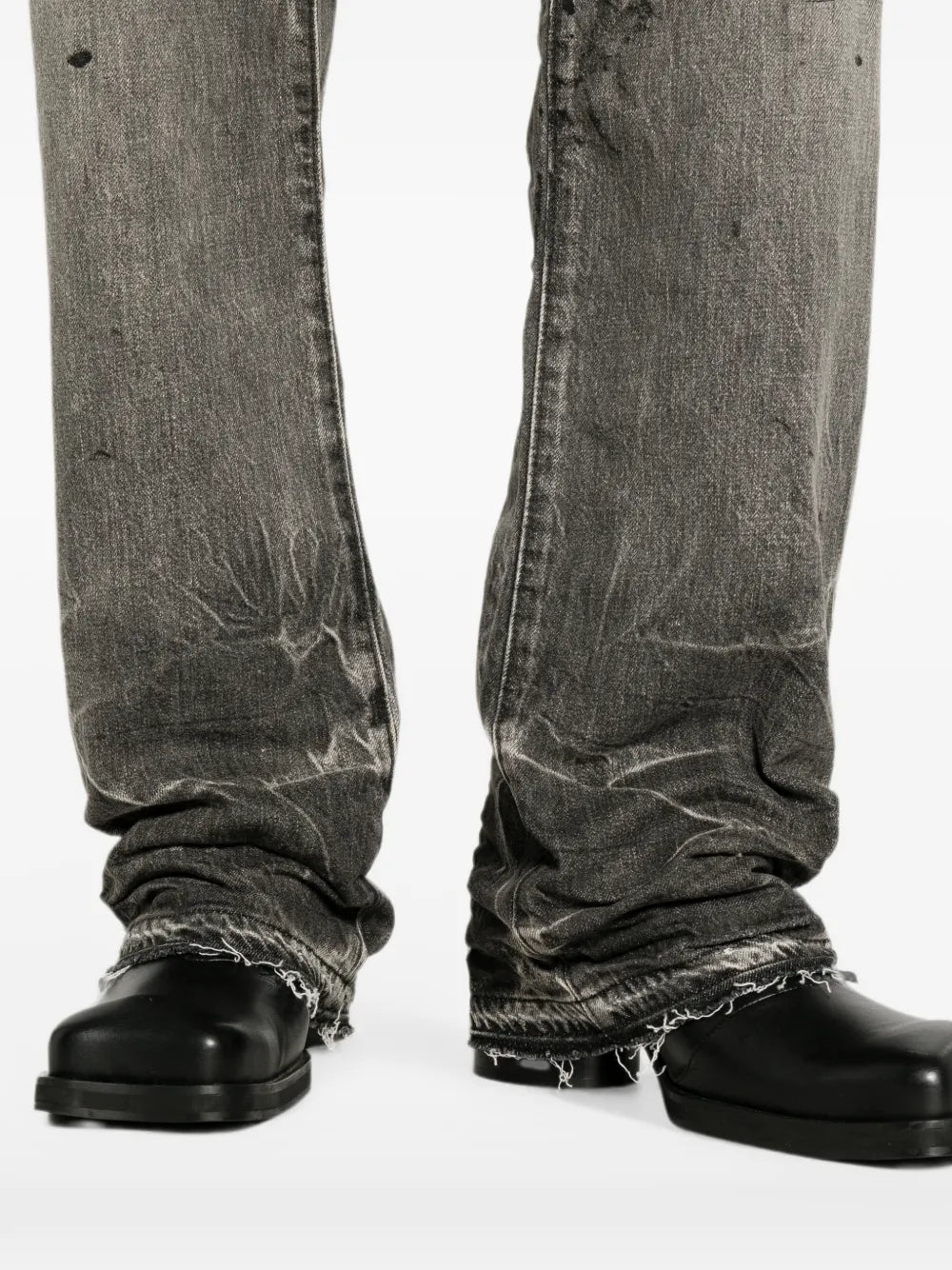 distressed paint-splatter jeans