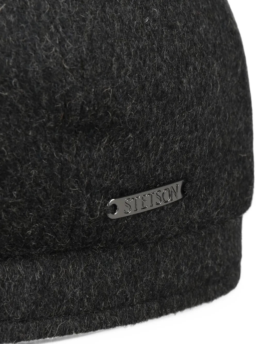 button-topped flat cap